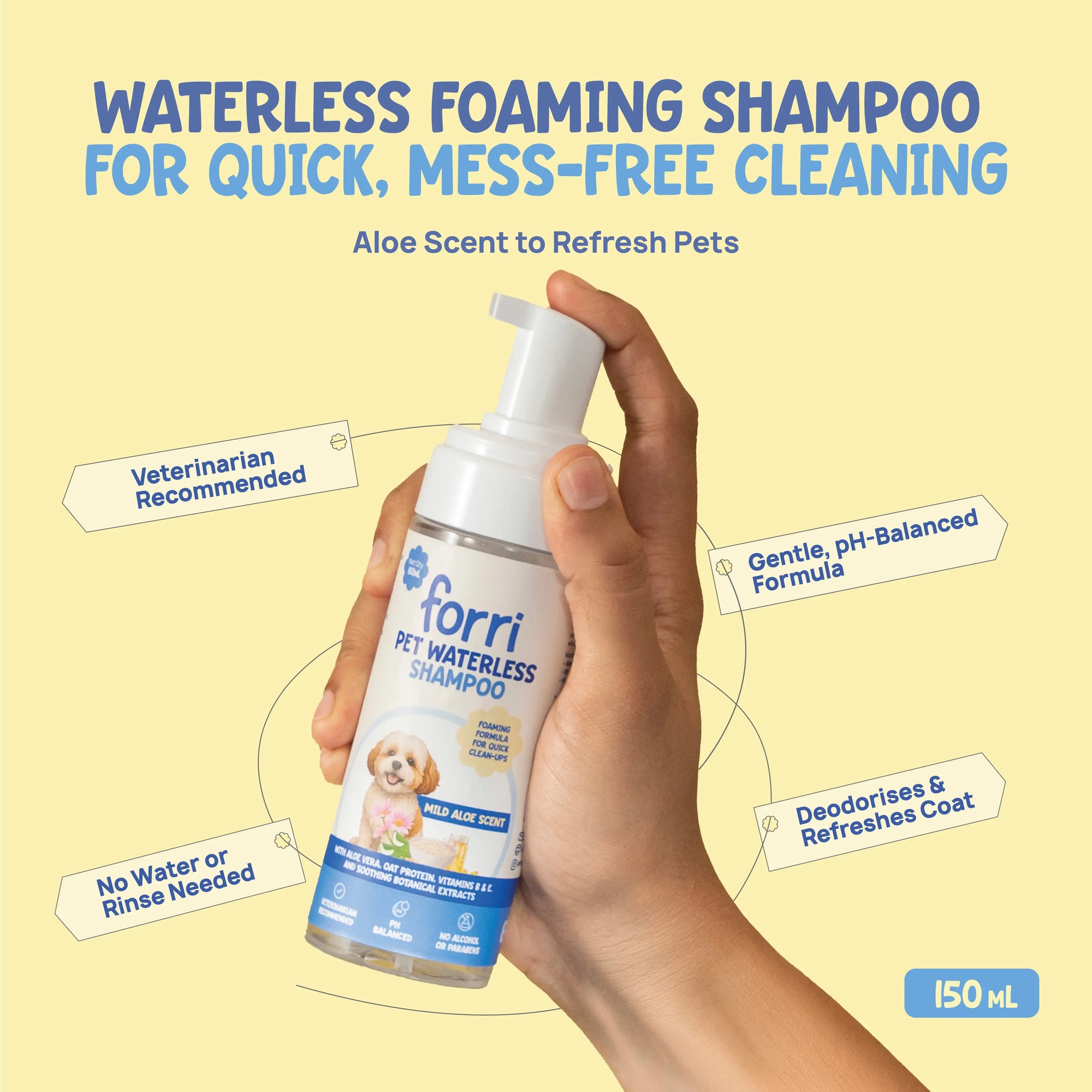 Hand holding a bottle of forri Pet Waterless Shampoo with veterinarian-recommended no-rinse formula to deodorise pet coats.